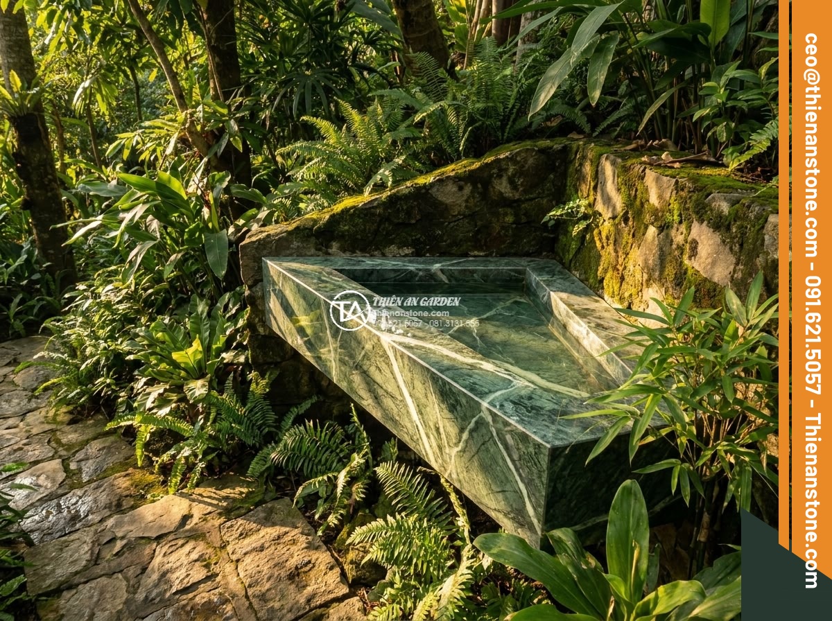 Lavabo đá xanh Ấn độ góc - Hình 2 Lavabo đá xanh Ấn độ góc - Cinematic shot of Indian green marble corner lavabo in natural garden setting at