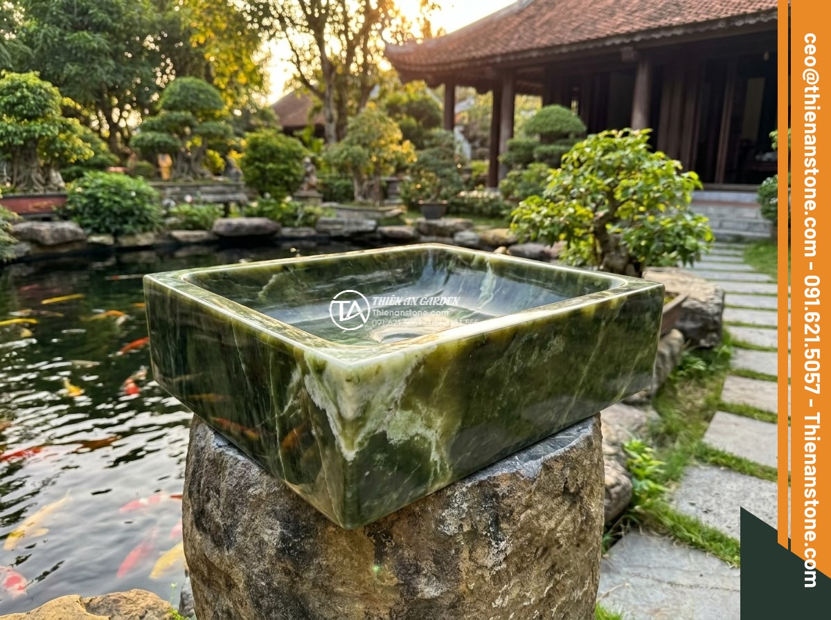 Lavabo đá xanh Ngọc Secpentine chữ nhật 42cm (420x350x140mm) - Hình 2 Lavabo đá xanh Ngọc Secpentine chữ nhật 42cm (420x350x140mm) - Photorealistic medium shot from a 45-degree angle showing the perfect rectangula
