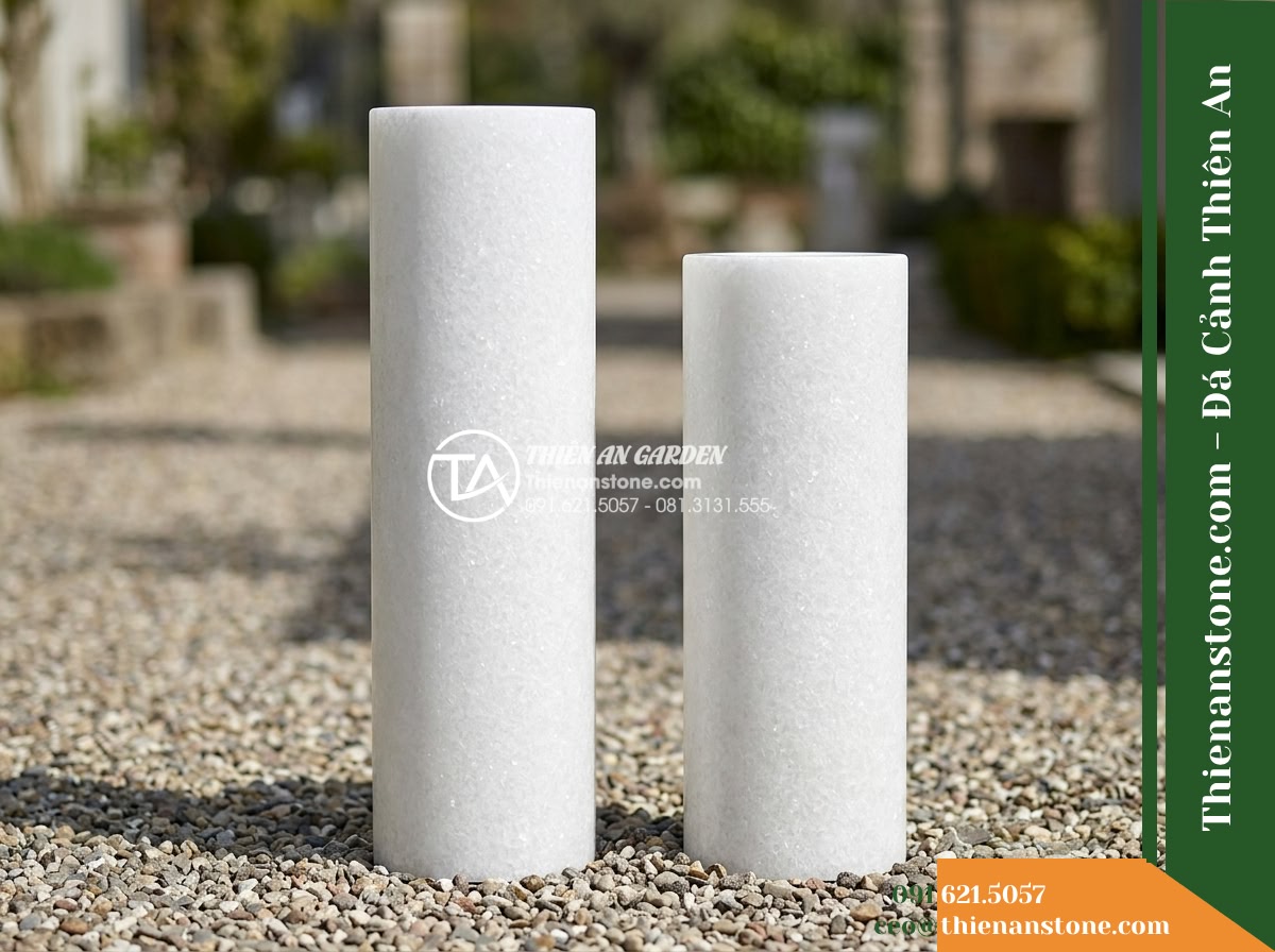 Bộ 2 Trụ Phun Tròn Đôi Mài Nhẵn, D30cm Cao 70-90cm - Hình 11 Bộ 2 Trụ Phun Tròn Đôi Mài Nhẵn, D30cm Cao 70-90cm - Studio-grade outdoor photograph of the two honed flat-top stone water pillars (D