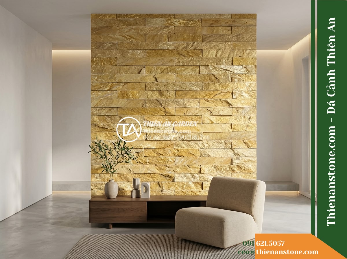 Đá ghép ánh kim vàng Nghệ An | Thạch anh vàng Nghệ An | 10x50 cm - Hình 19 Đá ghép ánh kim vàng Nghệ An | Thạch anh vàng Nghệ An | 10x50 cm - Full perspective of an architectural interior with a vertical golden quartzite f
