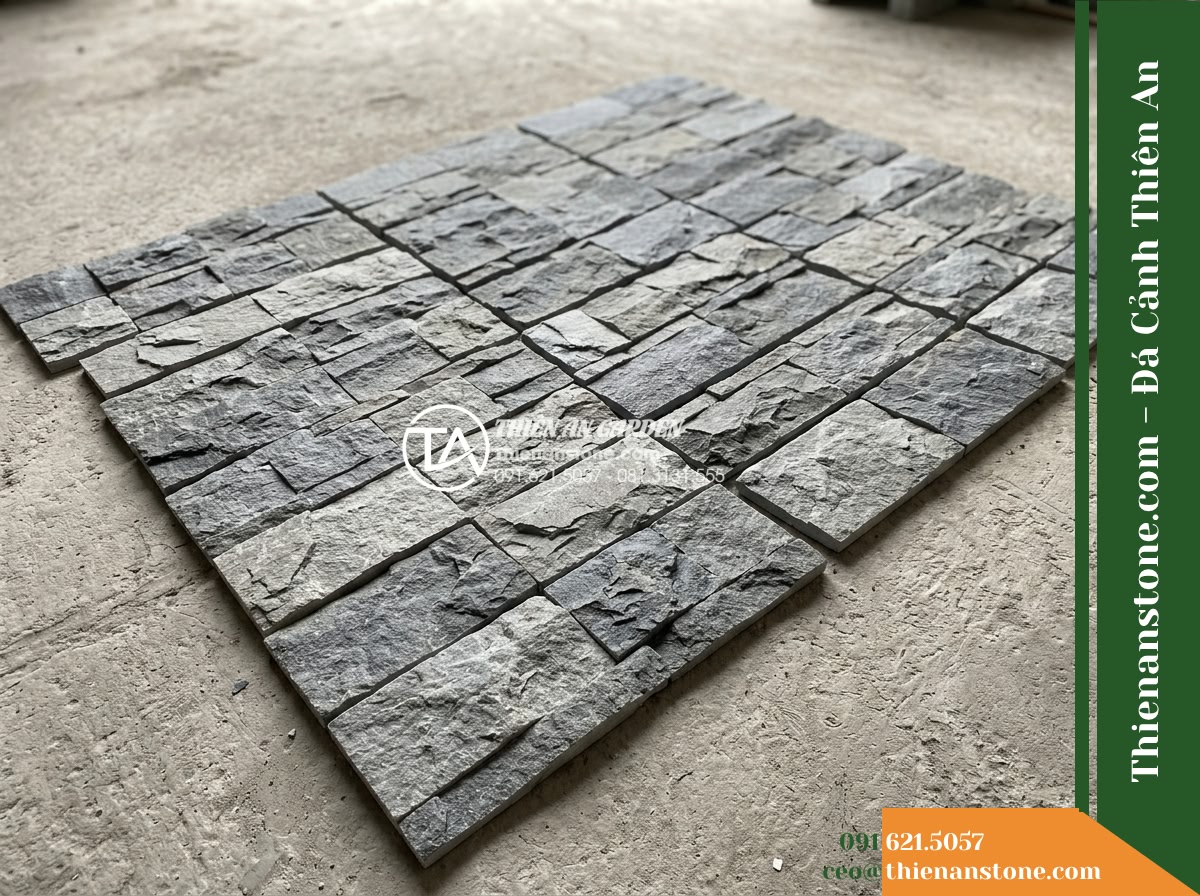 Đá ghép bazan Lâm Đồng | Bazan xám bóc thô Lâm Đồng | 10x50 cm - Hình 7 Đá ghép bazan Lâm Đồng | Bazan xám bóc thô Lâm Đồng | 10x50 cm - High-angle view of several 10x50 cm basalt mosaic panels dry-laid horizontally o