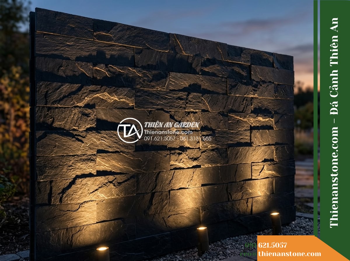 Đá ghép đen Đà Nẵng | Slate đen Đà Nẵng | 10x50 cm - Hình 14 Đá ghép đen Đà Nẵng | Slate đen Đà Nẵng | 10x50 cm - Warm low-angle landscape spotlights grazing upwards on a black stacked slate fen
