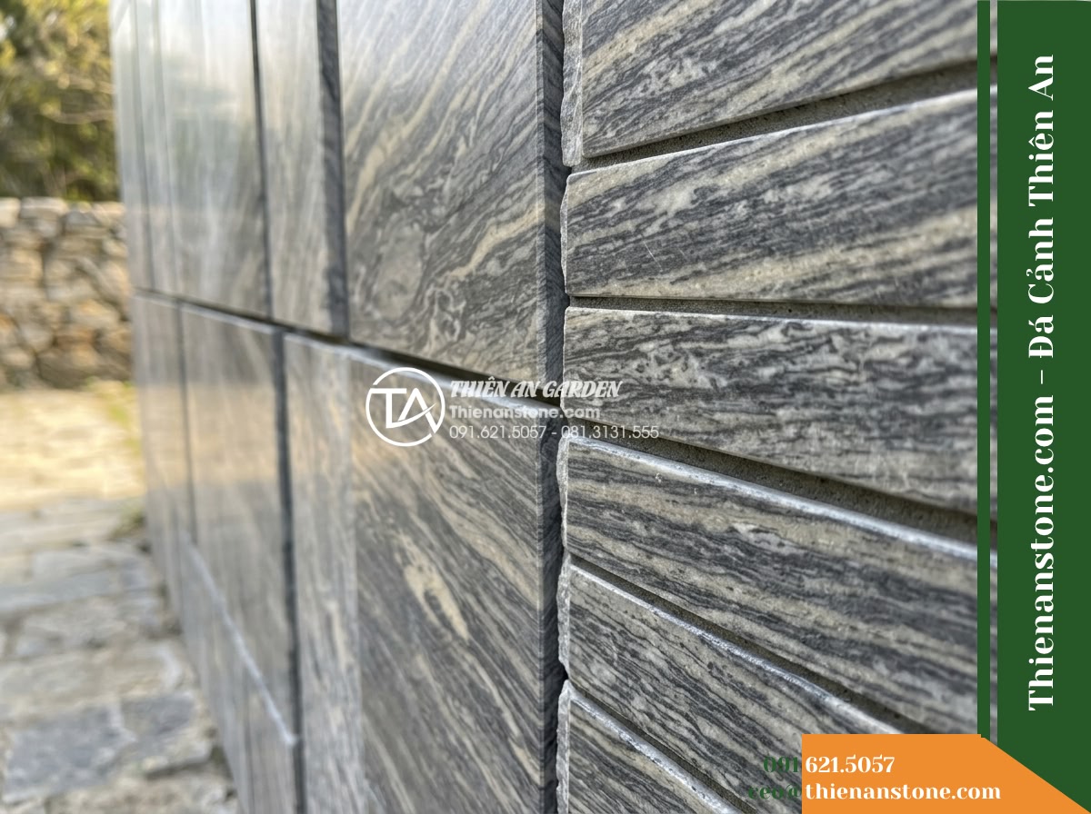 Đá ghép sọc dưa Hà Tĩnh | Marble sọc dưa Hà Tĩnh | 10x50 cm - Hình 15 Đá ghép sọc dưa Hà Tĩnh | Marble sọc dưa Hà Tĩnh | 10x50 cm - Macro inspection shot of narrow recessed joints between split stone strips on an