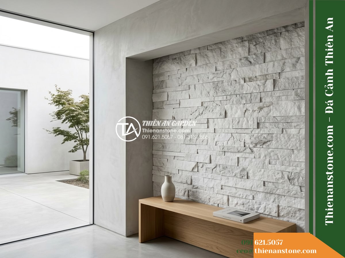 Đá ghép trắng ánh kim Yên Bái | Thạch anh / Marble trắng Yên Bái | 10x50 cm - Hình 12 Đá ghép trắng ánh kim Yên Bái | Thạch anh / Marble trắng Yên Bái | 10x50 cm - Contextual view of an architectural interior niche featuring natural white stone