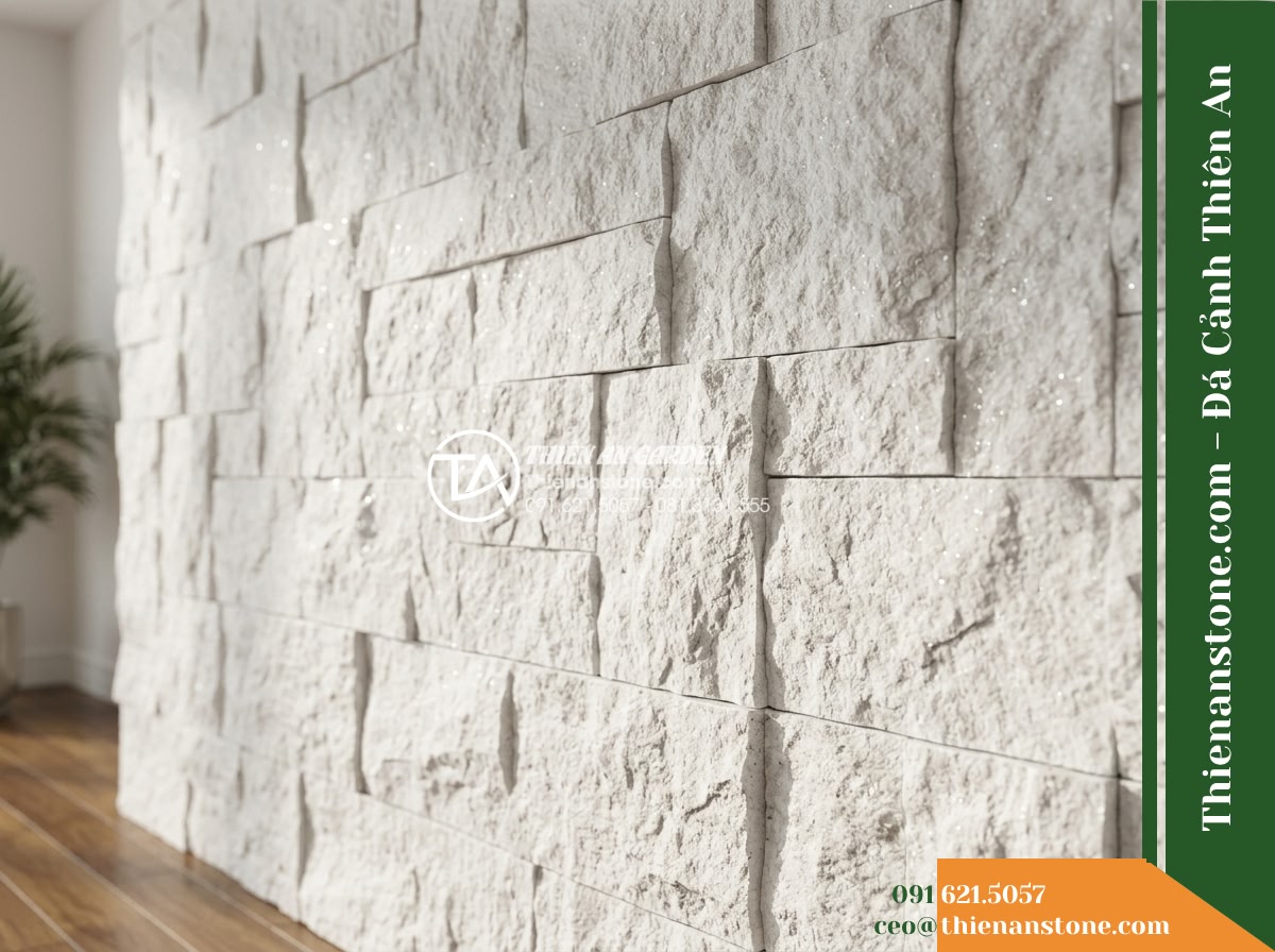 Đá ghép trắng ánh kim Yên Bái | Thạch anh / Marble trắng Yên Bái | 10x50 cm - Hình 13 Đá ghép trắng ánh kim Yên Bái | Thạch anh / Marble trắng Yên Bái | 10x50 cm - A white modular stone feature wall captured in soft morning daylight, highlighti