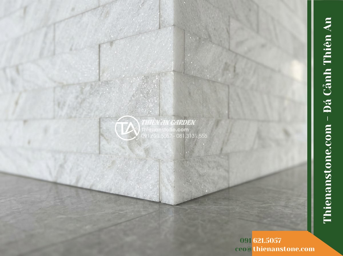 Đá ghép trắng ánh kim Yên Bái | Thạch anh / Marble trắng Yên Bái | 10x50 cm - Hình 20 Đá ghép trắng ánh kim Yên Bái | Thạch anh / Marble trắng Yên Bái | 10x50 cm - Final architectural detail shot focusing on the clean edge corner and polished f