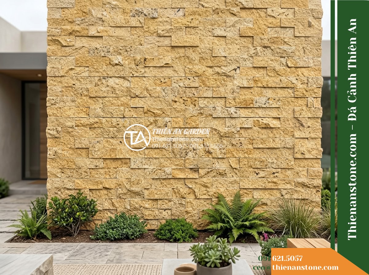 Đá ghép vàng Bình Định | Granite / Marble vàng Bình Định | 10x50 cm - Hình 1 Đá ghép vàng Bình Định | Granite / Marble vàng Bình Định | 10x50 cm - Architectural eye-level wide shot of an outdoor welcoming courtyard accent wall