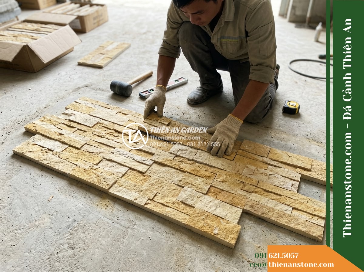 Đá ghép vàng Quỳ Hợp | Đá vôi vàng Quỳ Hợp | 10x40 cm - Hình 7 Đá ghép vàng Quỳ Hợp | Đá vôi vàng Quỳ Hợp | 10x40 cm - High-angle view of a mason dry-laying several 10x40 cm yellow limestone ledger p