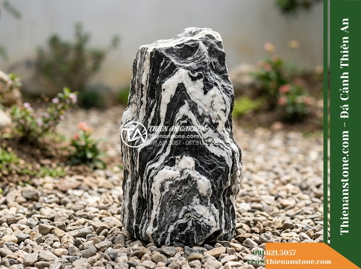 Đá Ngũ Vân Sơn (Size vừa 25–50cm) | Chuyên dựng hòn non bộ vừa. - Hình 11 Đá Ngũ Vân Sơn (Size vừa 25–50cm) | Chuyên dựng hòn non bộ vừa. - Individual display of a single 40cm weathered natural stone block with prominent