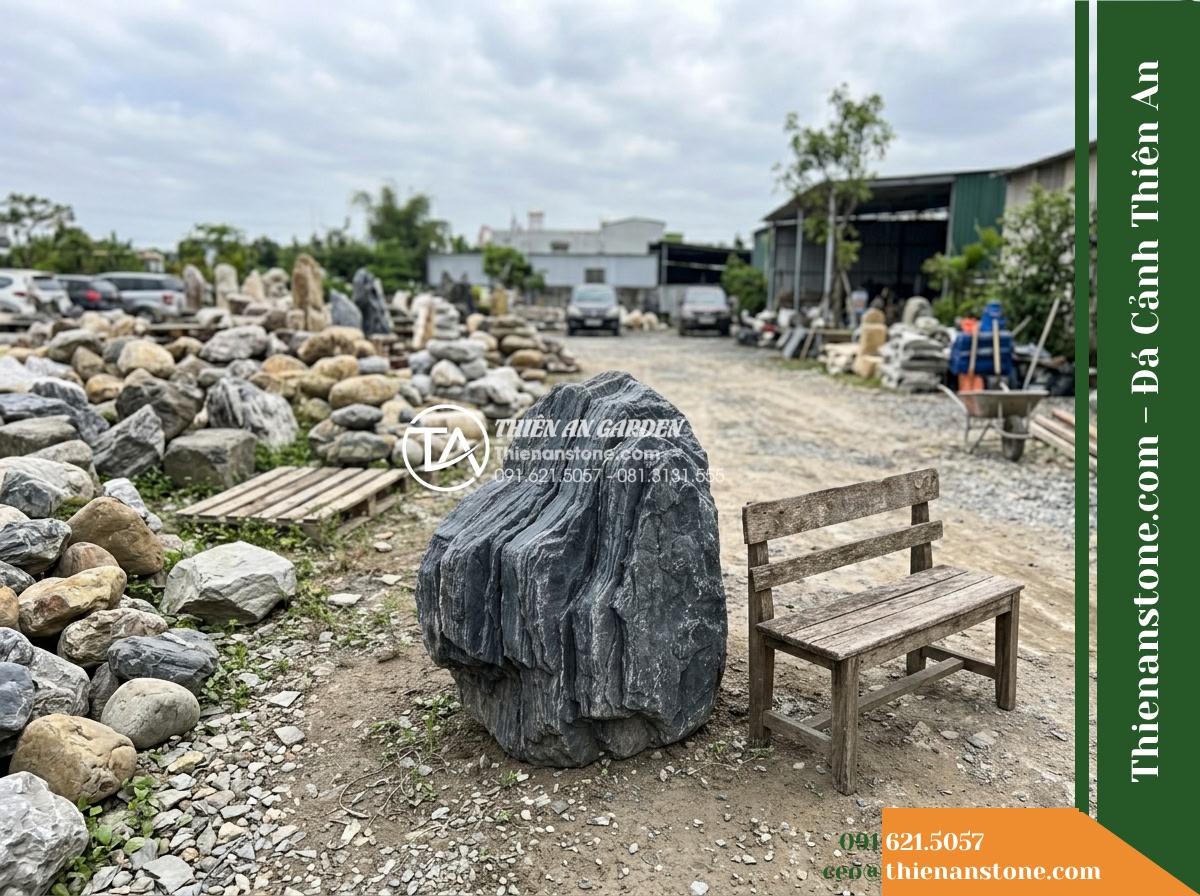 Đá Ông Phú (Khối đại 50–80cm) | Chuyên làm đá chủ, vách núi lớn hồ cá Koi. - Hình 6 Đá Ông Phú (Khối đại 50–80cm) | Chuyên làm đá chủ, vách núi lớn hồ cá Koi. - Slightly elevated perspective of an unfinished water garden installation showing
