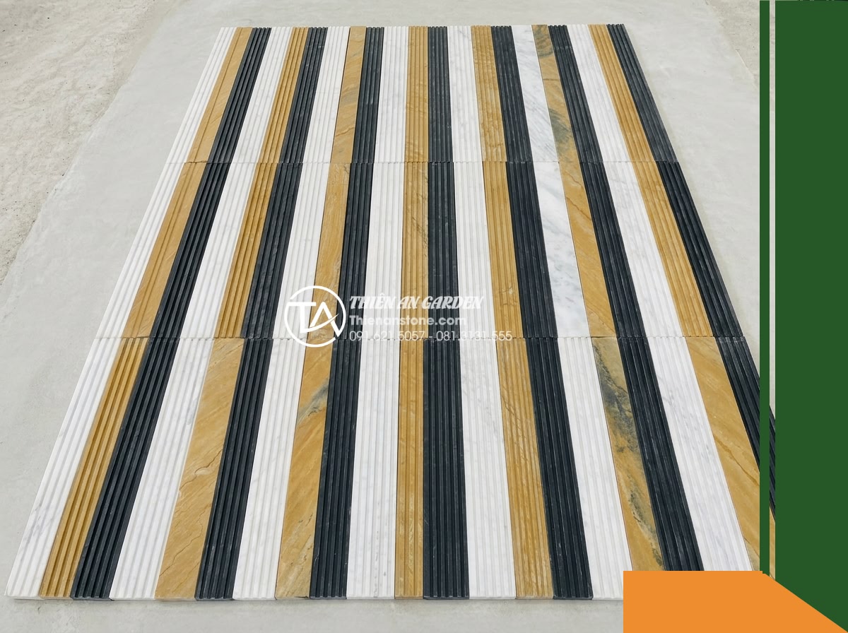 Đá răng lược 3 màu (Trắng - Vàng - Đen) | Marble & Slate phối kết hợp | 10x50 cm - Hình 7 Đá răng lược 3 màu (Trắng - Vàng - Đen) | Marble & Slate phối kết hợp | 10x50 cm - Overhead view of a dry-lay mock-up on a smooth ground surface, showing several 1