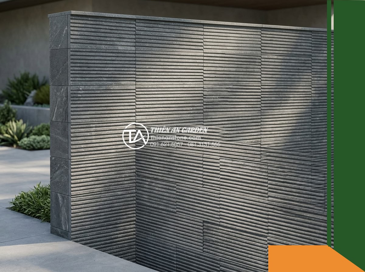 Đá răng lược bazan Gia Lai | Bazan xám đen Gia Lai | 10x50 cm - Hình 13 Đá răng lược bazan Gia Lai | Bazan xám đen Gia Lai | 10x50 cm - An outdoor entrance boundary wall clad with comb-toothed Gia Lai basalt stone ca