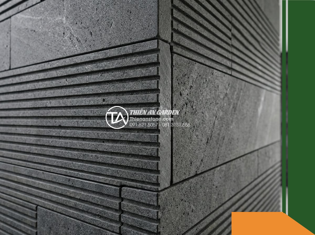 Đá răng lược bazan Gia Lai | Bazan xám đen Gia Lai | 10x50 cm - Hình 6 Đá răng lược bazan Gia Lai | Bazan xám đen Gia Lai | 10x50 cm - A detailed macro view of the terminating terminal edge of a comb-toothed basalt