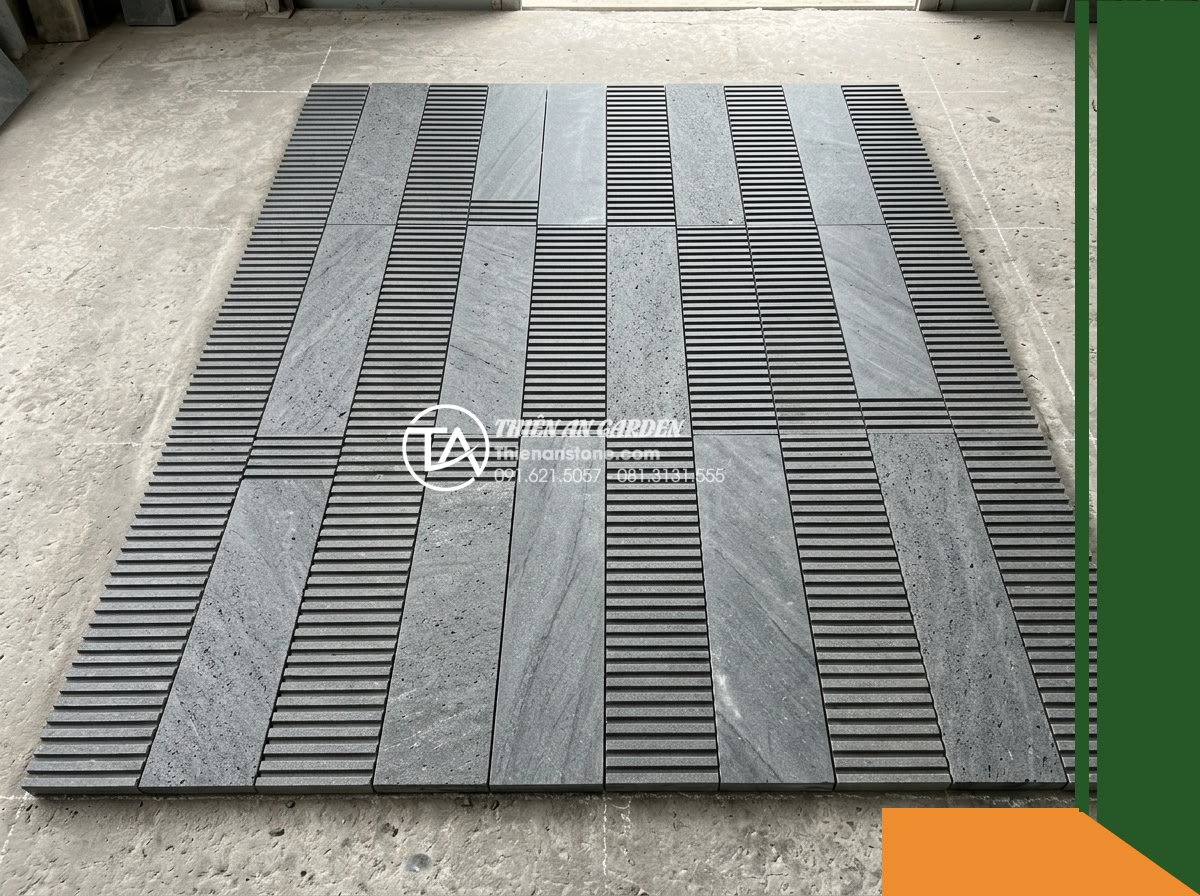 Đá răng lược bazan Gia Lai | Bazan xám đen Gia Lai | 10x50 cm - Hình 7 Đá răng lược bazan Gia Lai | Bazan xám đen Gia Lai | 10x50 cm - A flat-lay dry layout arrangement of several 10x50 cm comb-toothed dark grey bas