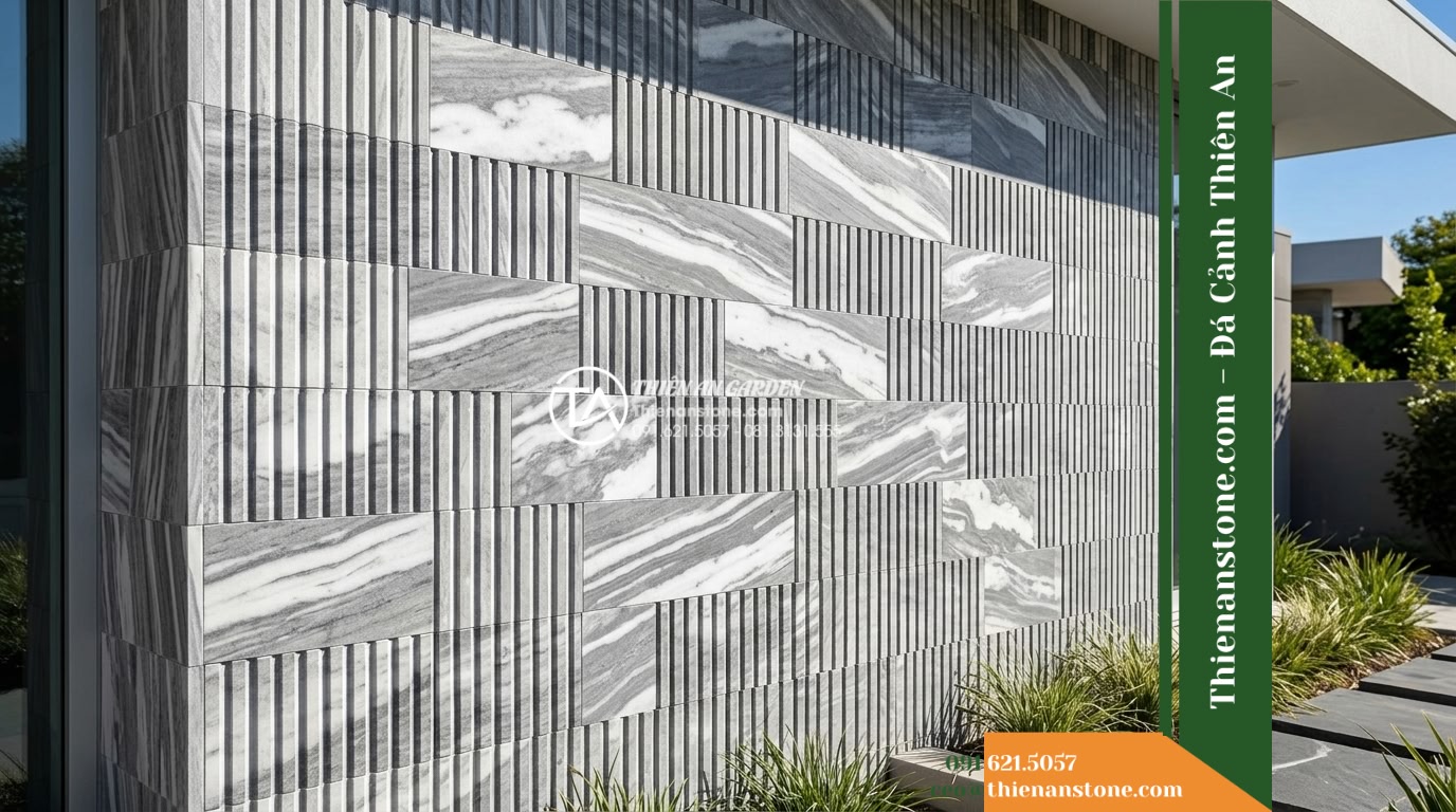 Đá răng lược sọc dưa Hà Tĩnh | Marble sọc dưa Hà Tĩnh | 10x50 cm - Hình 13 Đá răng lược sọc dưa Hà Tĩnh | Marble sọc dưa Hà Tĩnh | 10x50 cm - Exterior wall clad in Ha Tinh combed marble under bright midday natural sunlight