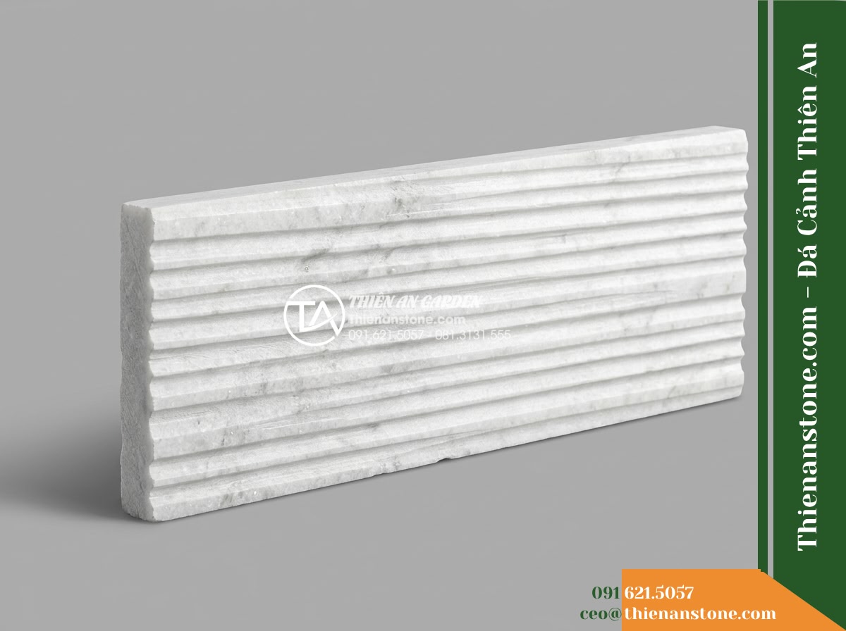 Đá răng lược trắng Nghệ An | Marble trắng Nghệ An | 10x50 cm - Hình 11 Đá răng lược trắng Nghệ An | Marble trắng Nghệ An | 10x50 cm - Studio product photograph of a single 10x50 cm white Nghe An combed marble tile,