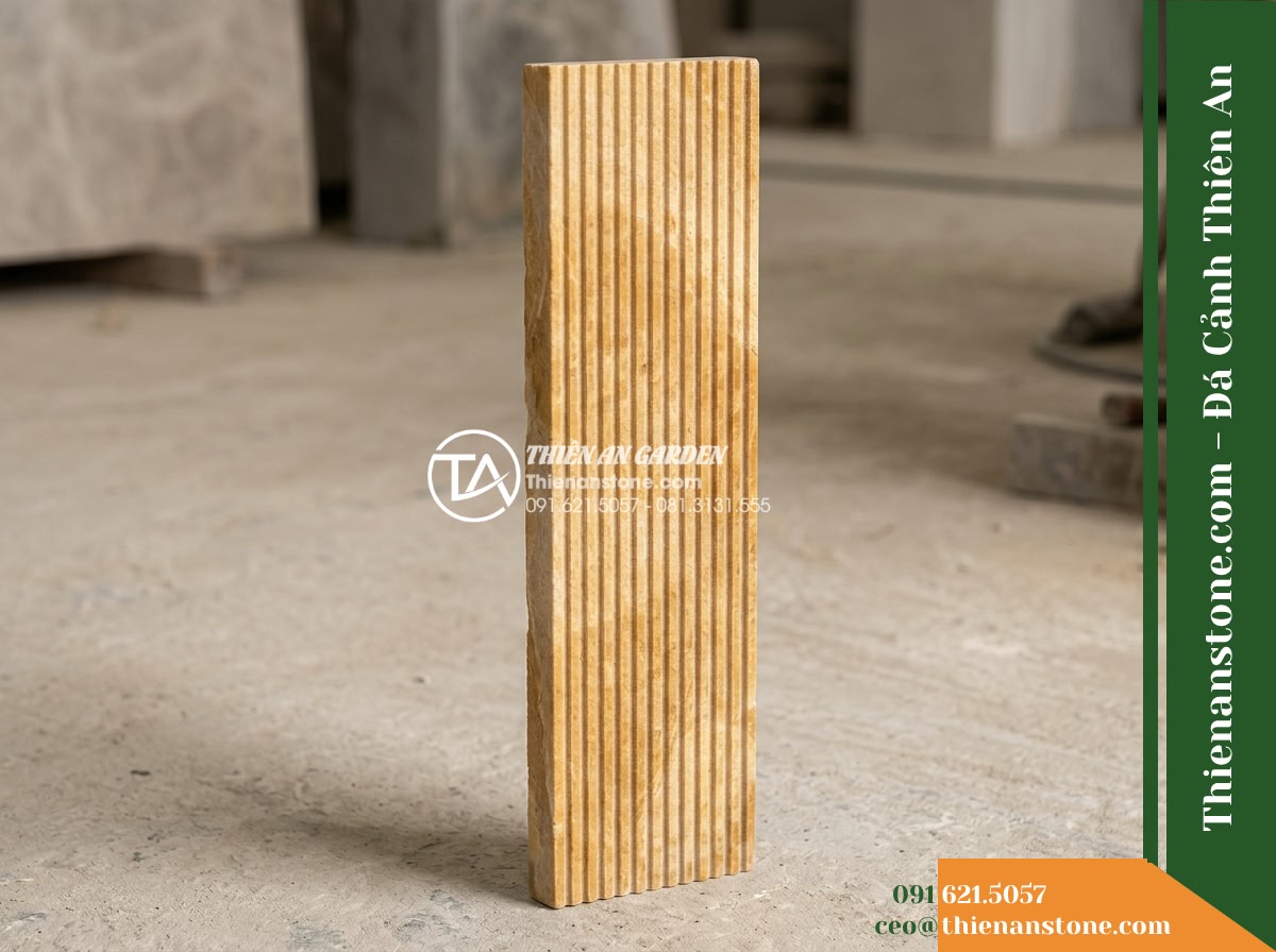 Đá răng lược vàng Nghệ An | Marble vàng Nghệ An | 10x50 cm - Hình 11 Đá răng lược vàng Nghệ An | Marble vàng Nghệ An | 10x50 cm - A standalone product display of a single 10x50 cm yellow Marble comb-cut stone t
