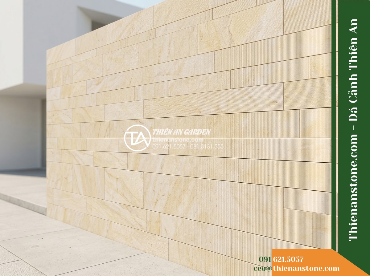 Đá răng lược vàng Nghệ An | Marble vàng Nghệ An | 10x50 cm - Hình 13 Đá răng lược vàng Nghệ An | Marble vàng Nghệ An | 10x50 cm - The yellow comb-cut stone wall photographed under direct natural midday sun, sho