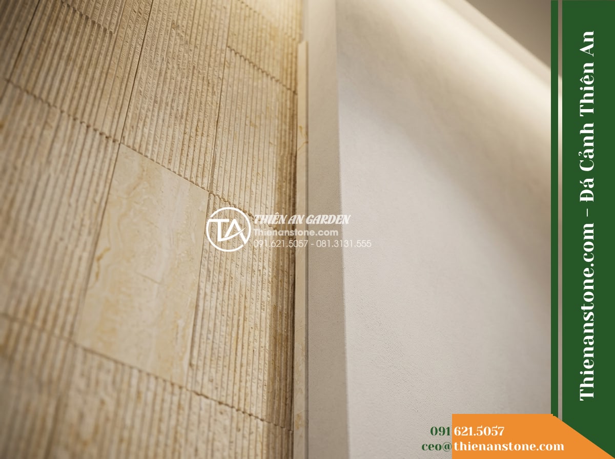 Đá răng lược vàng Nghệ An | Marble vàng Nghệ An | 10x50 cm - Hình 2 Đá răng lược vàng Nghệ An | Marble vàng Nghệ An | 10x50 cm - A diagonal architectural detail shot focusing on the junction between the 10x50