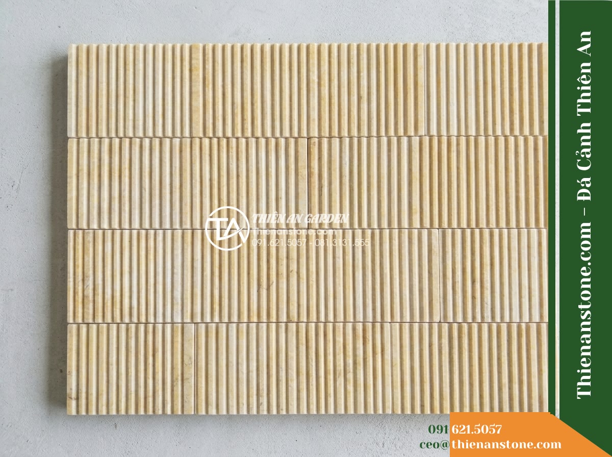 Đá răng lược vàng Nghệ An | Marble vàng Nghệ An | 10x50 cm - Hình 7 Đá răng lược vàng Nghệ An | Marble vàng Nghệ An | 10x50 cm - A small mock-up dry layout of yellow marble comb-cut stone tiles laid horizontal