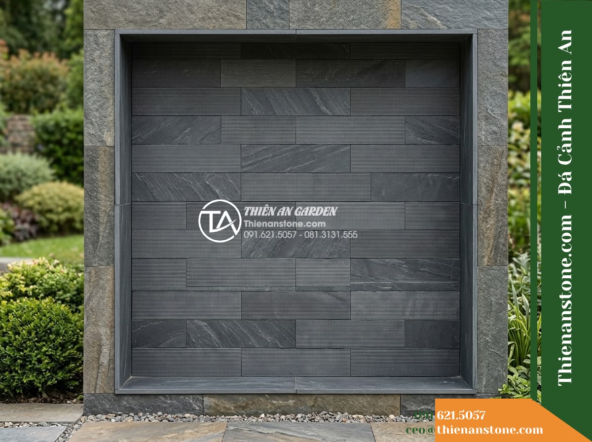 Đá răng lược xám đen Hòa Bình | Slate xám đen Hòa Bình | 10x50 cm - Hình 5 Đá răng lược xám đen Hòa Bình | Slate xám đen Hòa Bình | 10x50 cm - Eye-level elevation perspective of an outdoor garden wall niche showing the hori