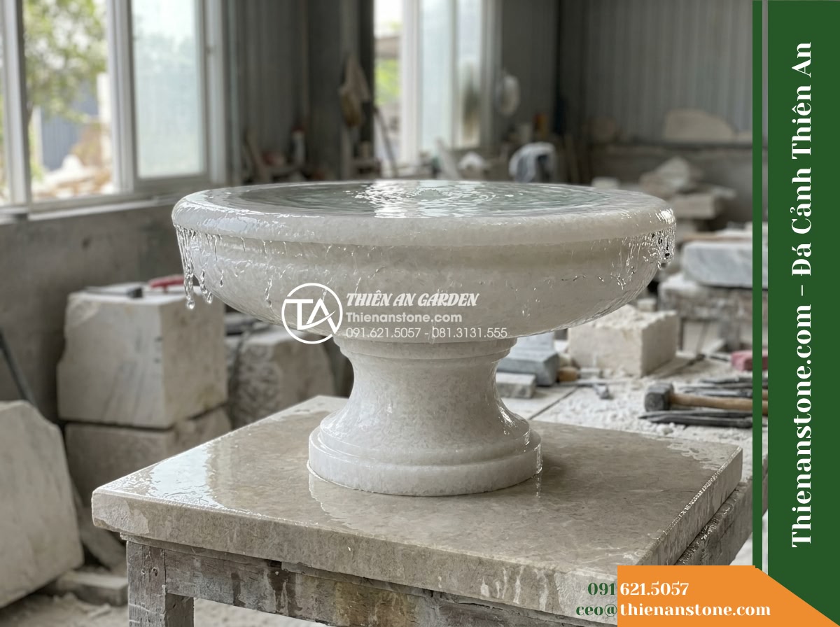 Đài Phun Bát Đơn Chân Thấp Phẳng Mặt, Bát D80cm Cao 50cm - Hình 19 Đài Phun Bát Đơn Chân Thấp Phẳng Mặt, Bát D80cm Cao 50cm - An authentic stonemasonry workshop photograph showing a finished D80cm H50cm low
