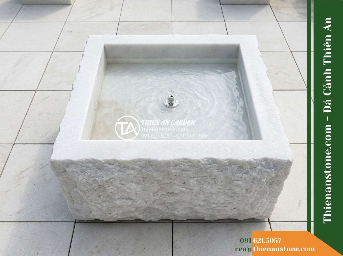 Đài Phun Bát Vuông Lòng Mài Mịn Vỏ Thô, Bát D80cm Cao 75cm - Hình 6 Đài Phun Bát Vuông Lòng Mài Mịn Vỏ Thô, Bát D80cm Cao 75cm - High-angle overview looking down at the 80cm square stone fountain centered neat
