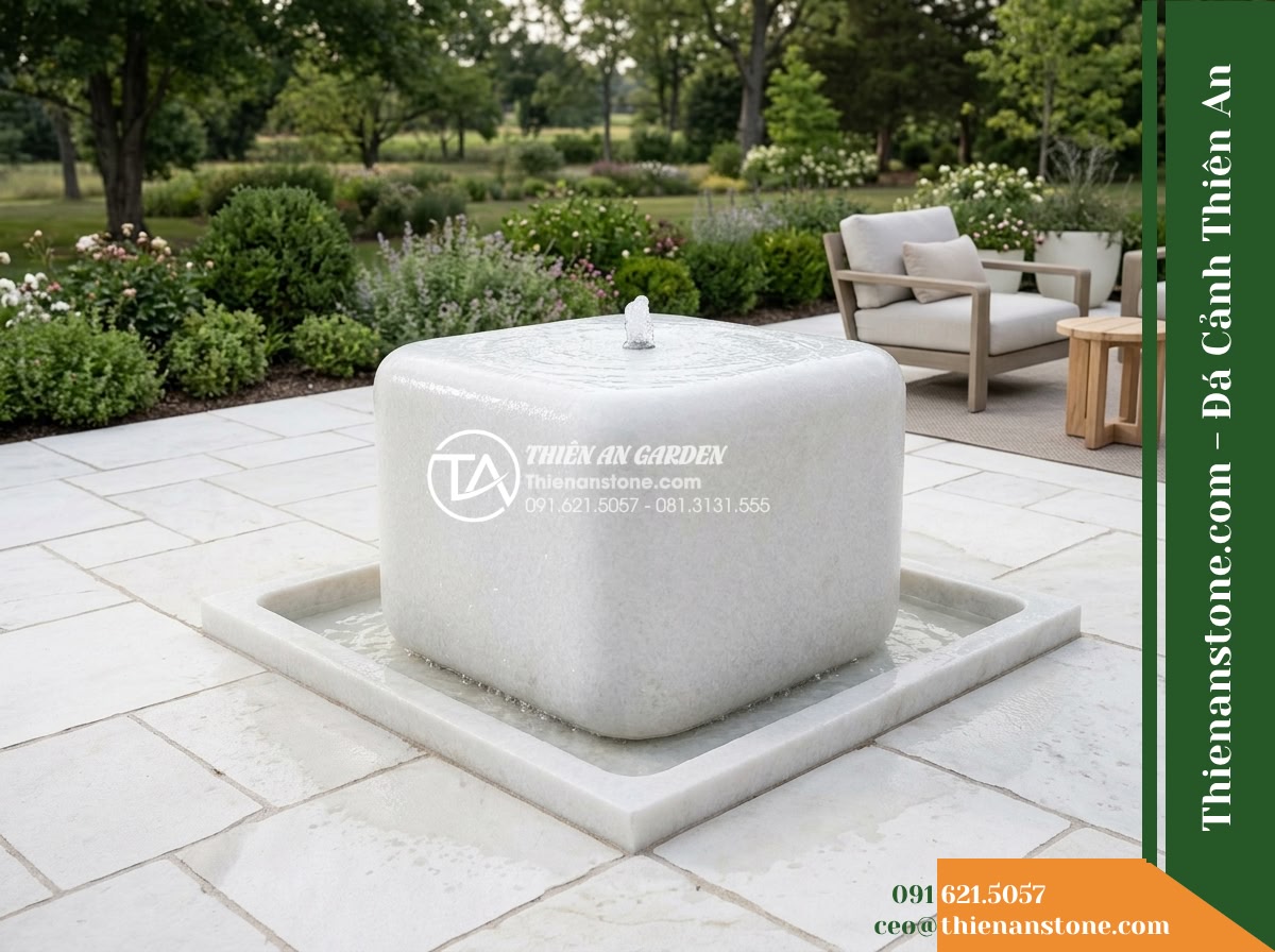 Đài Phun Khối Bo Vuông Khò Mặt Nước, 60x60cm Cao 90cm - Hình 12 Đài Phun Khối Bo Vuông Khò Mặt Nước, 60x60cm Cao 90cm - Wide landscape scene showcasing the proper viewing clearance around the monolith