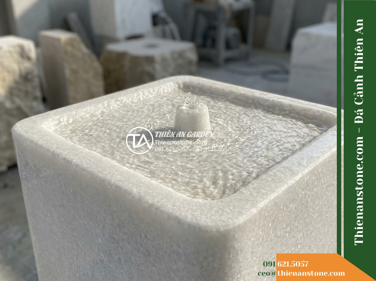 Đài Phun Khối Bo Vuông Khò Mặt Nước, 60x60cm Cao 90cm - Hình 15 Đài Phun Khối Bo Vuông Khò Mặt Nước, 60x60cm Cao 90cm - Detailed inspection view of the top flamed basin and central water outlet nozzle