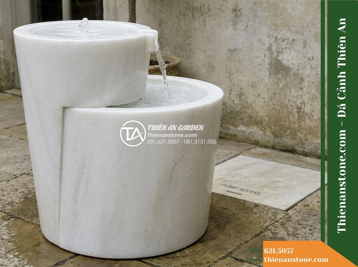 Đài Phun Lu Nước Xếp 2 Tầng Lệch, D40cm Cao 90cm - Hình 16 Đài Phun Lu Nước Xếp 2 Tầng Lệch, D40cm Cao 90cm - Rear maintenance perspective showing ample clearance between the stone water fou
