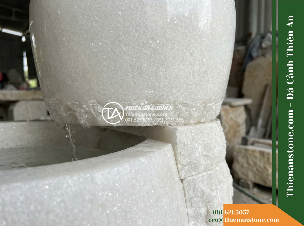 Đài Phun Lu Nước Xếp 2 Tầng Lệch, D40cm Cao 90cm - Hình 4 Đài Phun Lu Nước Xếp 2 Tầng Lệch, D40cm Cao 90cm - Detailed low-angle view showing the structural connection point where the upper
