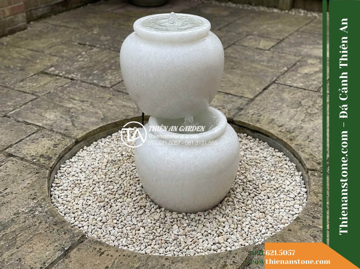 Đài Phun Lu Nước Xếp 2 Tầng Lệch, D40cm Cao 90cm - Hình 6 Đài Phun Lu Nước Xếp 2 Tầng Lệch, D40cm Cao 90cm - Slightly elevated view of D40cm fountain footprint showing the necessary clear p