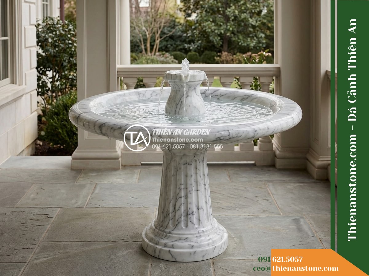 Đài Phun Trắng Mịn Vành Bo Tròn Lụa, Bát D80cm Cao 1.2m - Hình 19 Đài Phun Trắng Mịn Vành Bo Tròn Lụa, Bát D80cm Cao 1.2m - Balanced architectural daytime photograph of the finished white stone fountain o