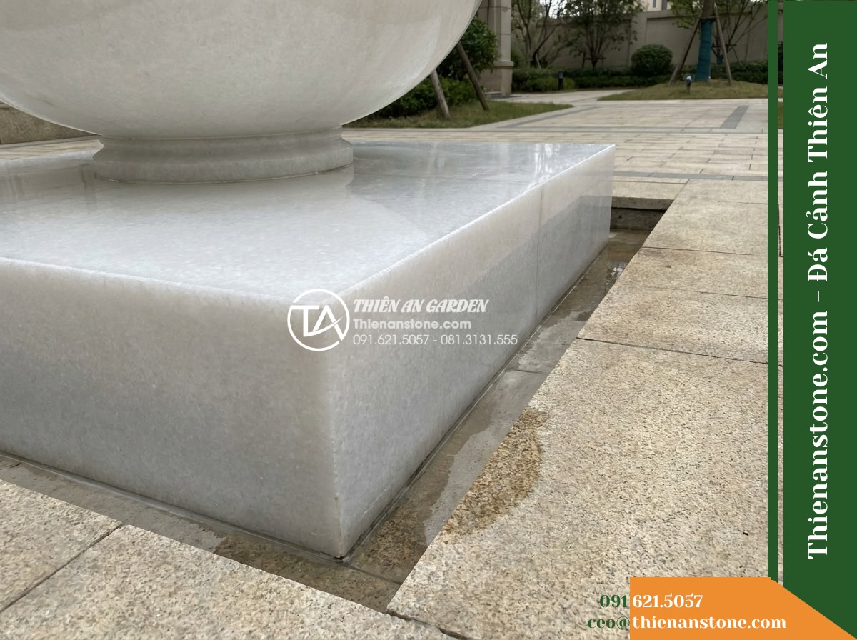 Đài Phun Trắng Ngọc Chân Vuông Mịn, Bát D1.1m Cao 1.5m - Hình 16 Đài Phun Trắng Ngọc Chân Vuông Mịn, Bát D1.1m Cao 1.5m - Rear angle view focusing on the clean, properly sealed joint between the square