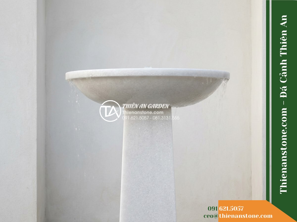 Đài Phun Xám Khói Vệt Cắt Tối Giản, Bát D1m Cao 1.3m - Hình 11 Đài Phun Xám Khói Vệt Cắt Tối Giản, Bát D1m Cao 1.3m - A focused horizontal composition displaying the distinct monolithic silhouette o
