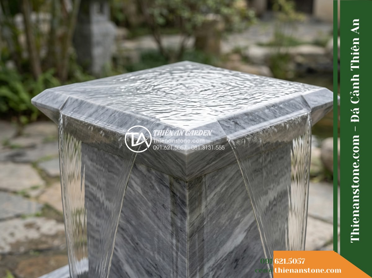 Đài Phun Xám Vân Mây Cắt Khối Cặp, 70x70cm Cao 1.1m - Hình 7 Đài Phun Xám Vân Mây Cắt Khối Cặp, 70x70cm Cao 1.1m - Close detailed shot of thin laminar water sheets cascading smoothly over the fou