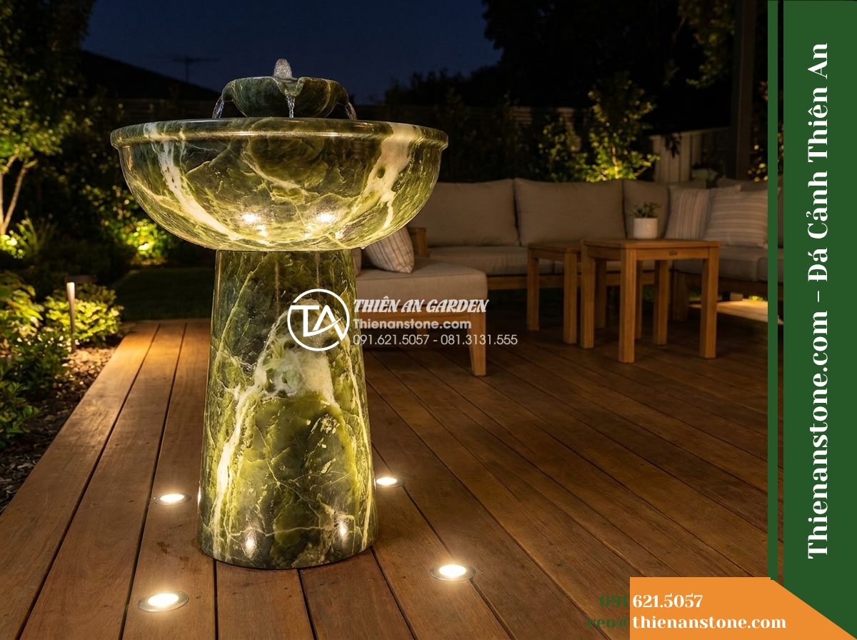 Đài Phun Xanh Thấu Quang Đỉnh Phun, Bát D85cm Cao 1.3m - Hình 10 Đài Phun Xanh Thấu Quang Đỉnh Phun, Bát D85cm Cao 1.3m - An alternative night perspective showing the green stone water fountain viewed f