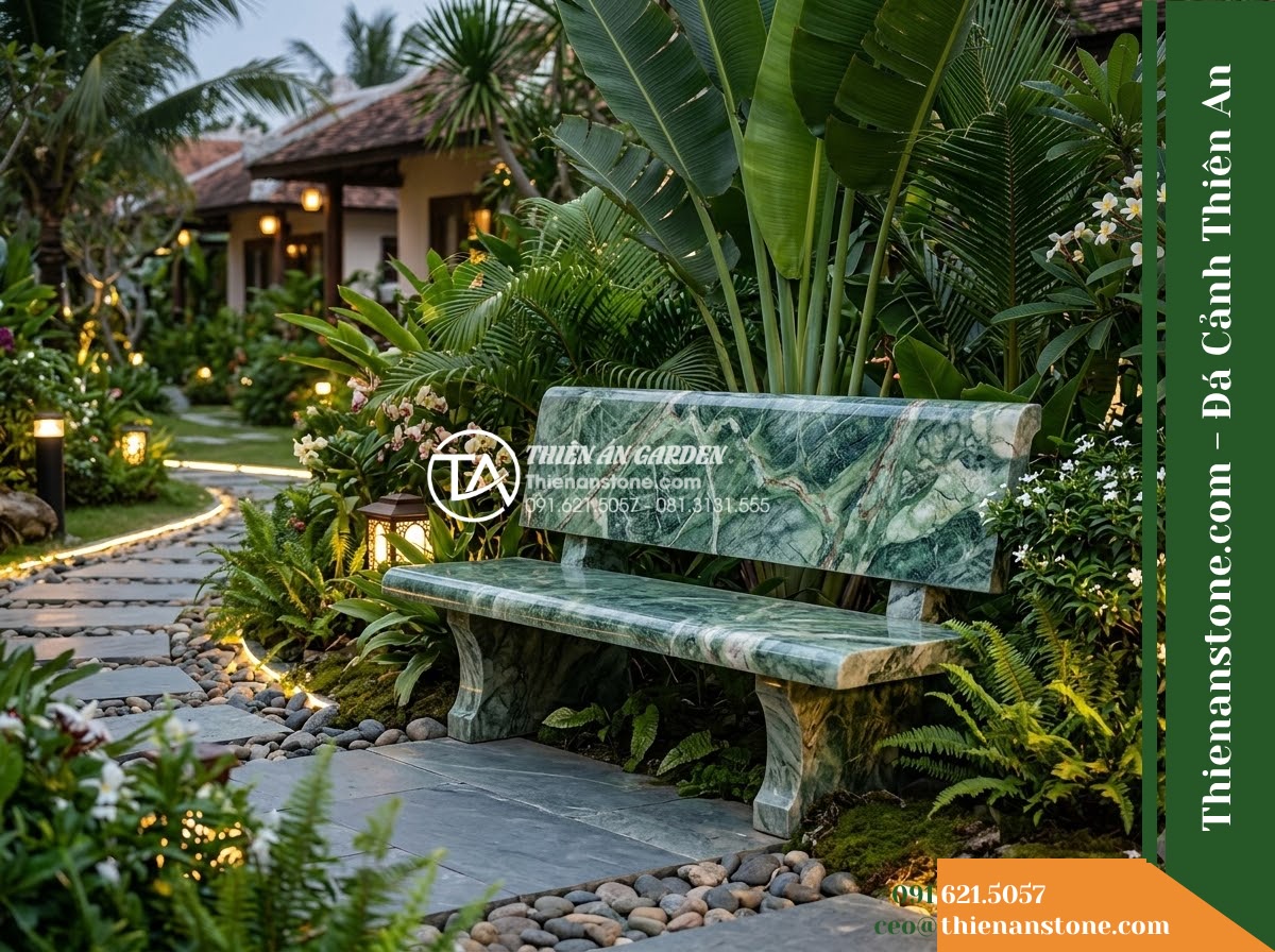 Ghế Đá Công Viên Có Tựa Cao Thanh Phong 160x50x90cm - Đá Xanh Cẩm Thạch - Hình 4 Ghế Đá Công Viên Có Tựa Cao Thanh Phong 160x50x90cm - Đá Xanh Cẩm Thạch - A green marble stone bench integrated into a Vietnamese luxury resort landscape