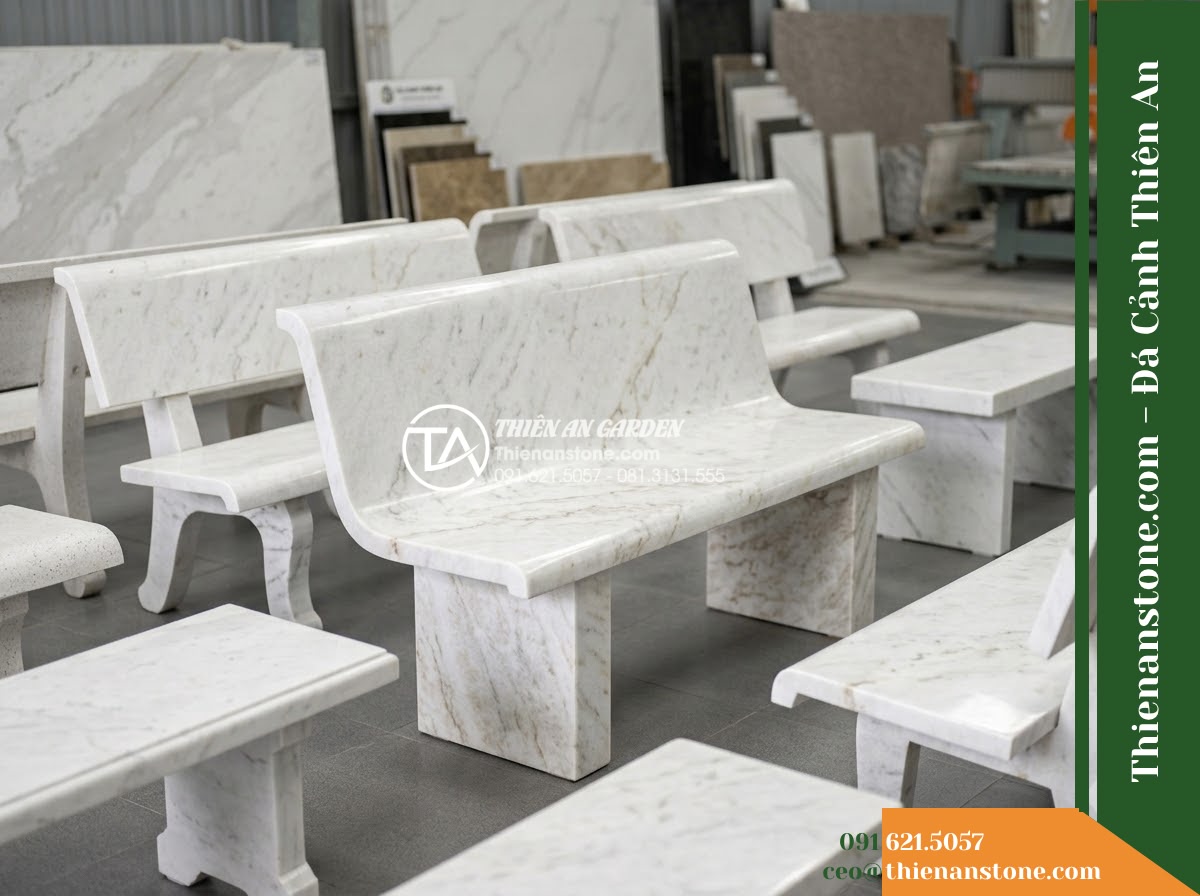 Ghế Đá Công Viên Không Tựa Chân Khối Hưng Thịnh 160x45x45cm - Đá Trắng Cẩm Thạch - Hình 6 Ghế Đá Công Viên Không Tựa Chân Khối Hưng Thịnh 160x45x45cm - Đá Trắng Cẩm Thạch - Showroom display of various white marble stone benches at Da Canh Thien An, prof