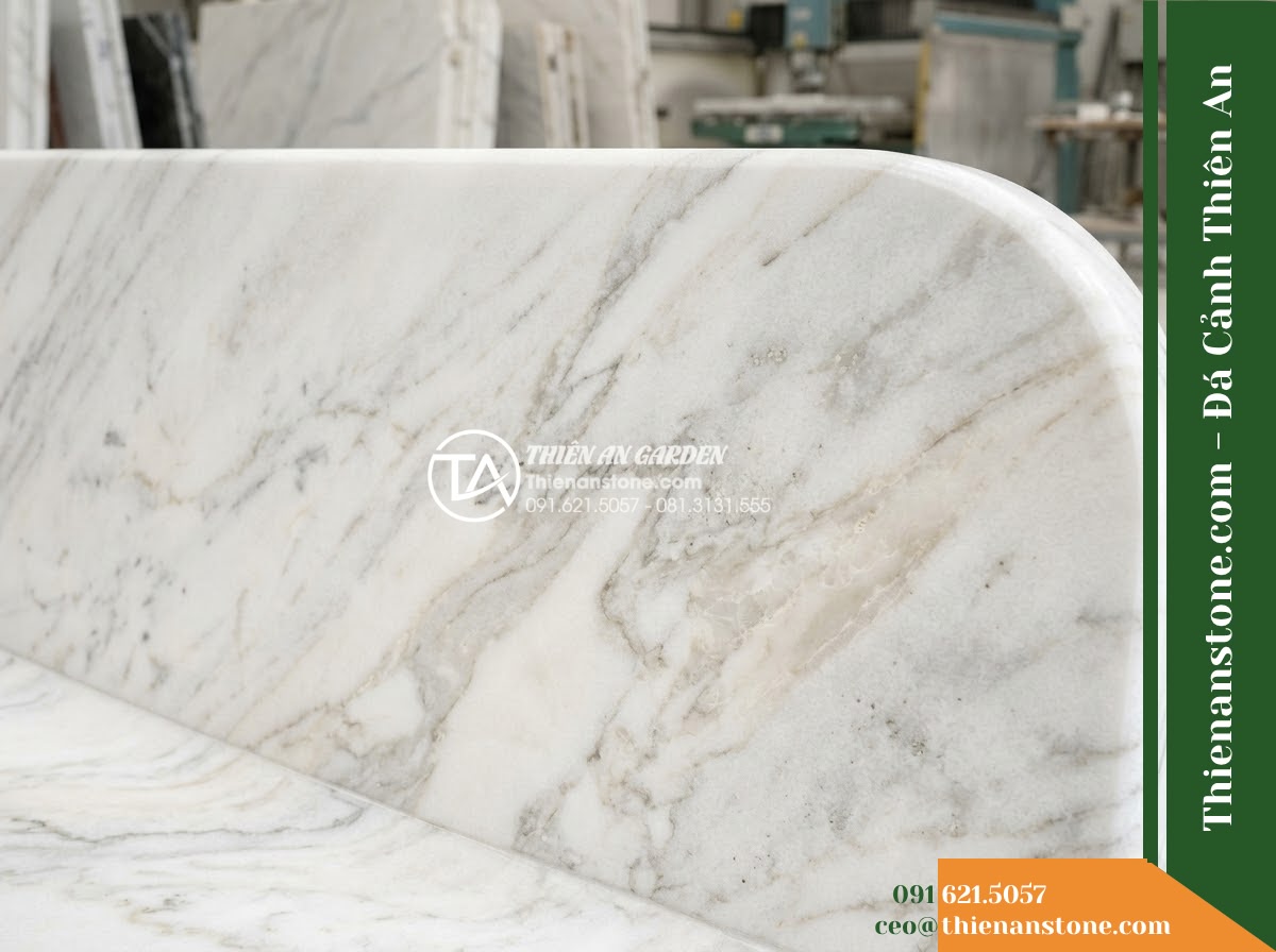 Ghế Đá Công Viên Không Tựa Chân Trụ Bảo An 150x45x45cm - Đá Vàng Cẩm Thạch - Hình 3 Ghế Đá Công Viên Không Tựa Chân Trụ Bảo An 150x45x45cm - Đá Vàng Cẩm Thạch - golden marble stone bench flanked by potted bonsai trees on a resort terrace ove