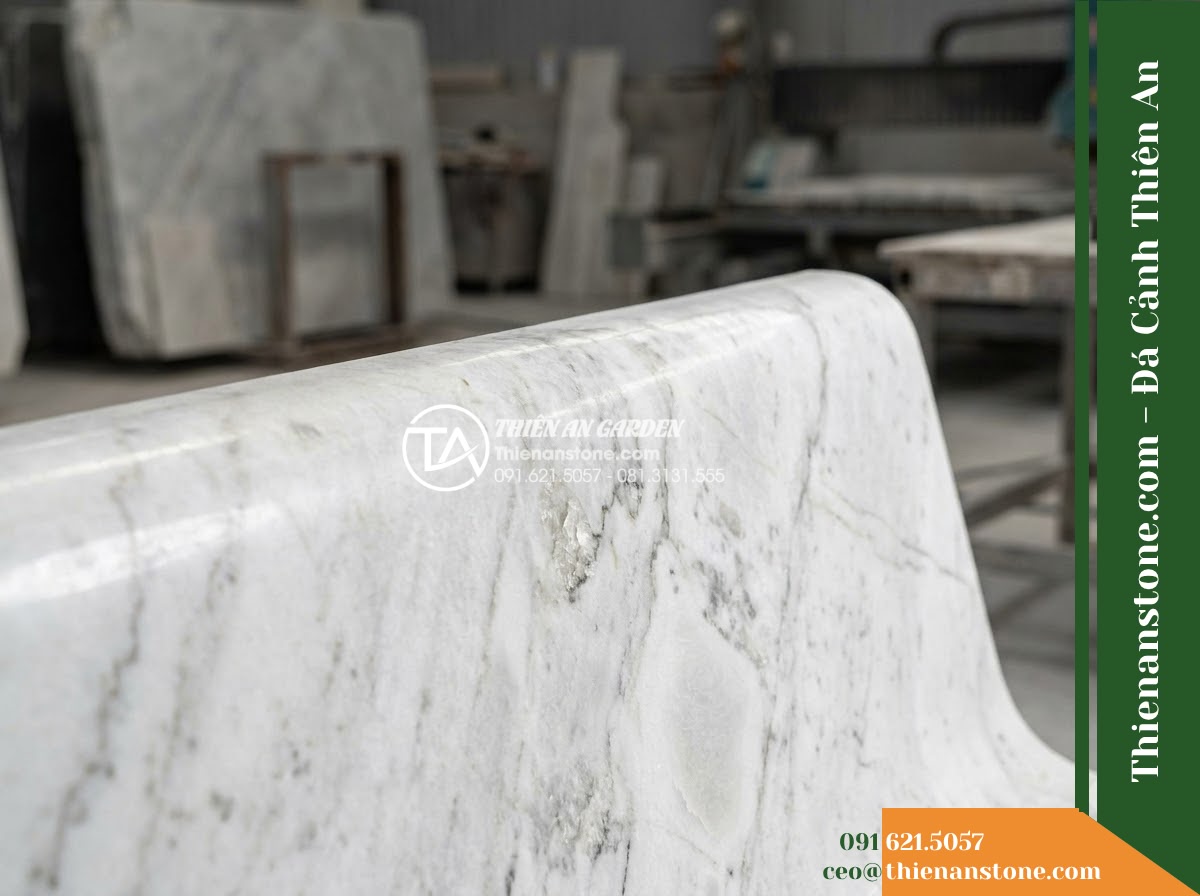 Ghế Đá Granite Nguyên Khối Khải Minh – Kích thước 185 x 45 x 45 cm – Kiểu dáng thanh dài, chân chữ T kép. Chất liệu đá granite - Hình 3 Ghế Đá Granite Nguyên Khối Khải Minh – Kích thước 185 x 45 x 45 cm – Kiểu dáng thanh dài, chân chữ T kép. Chất liệu đá granite - natural granite stone bench flanked by potted bonsai trees on a resort terrace o