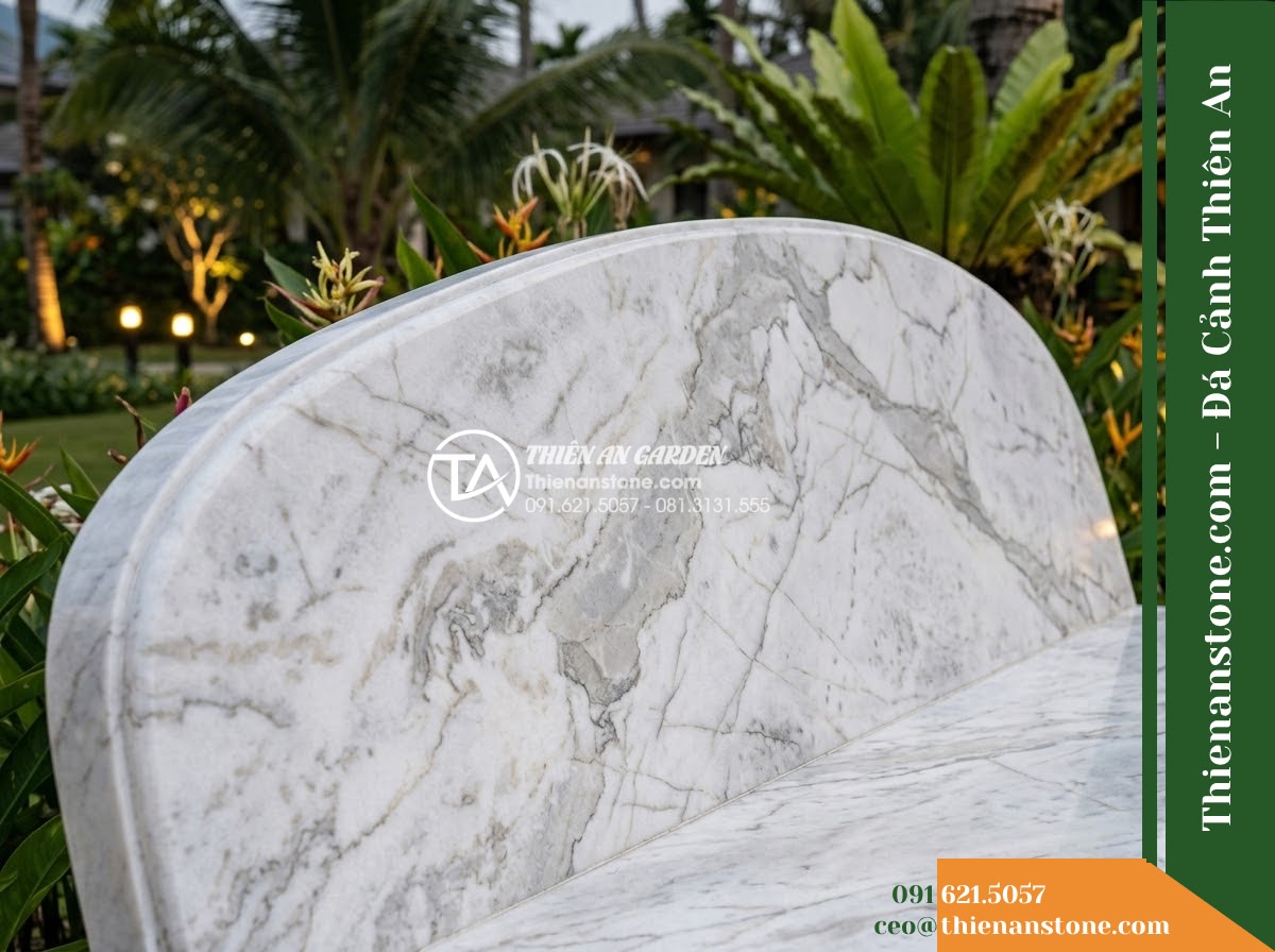Ghế Đá Granite Nguyên Khối Khánh An – Kích thước 175 x 46 x 45 cm – Kiểu dáng mặt chữ nhật, chân khối chữ T. Chất liệu đá granite - Hình 4 Ghế Đá Granite Nguyên Khối Khánh An – Kích thước 175 x 46 x 45 cm – Kiểu dáng mặt chữ nhật, chân khối chữ T. Chất liệu đá granite - A natural granite stone bench integrated into a Vietnamese luxury resort landsca