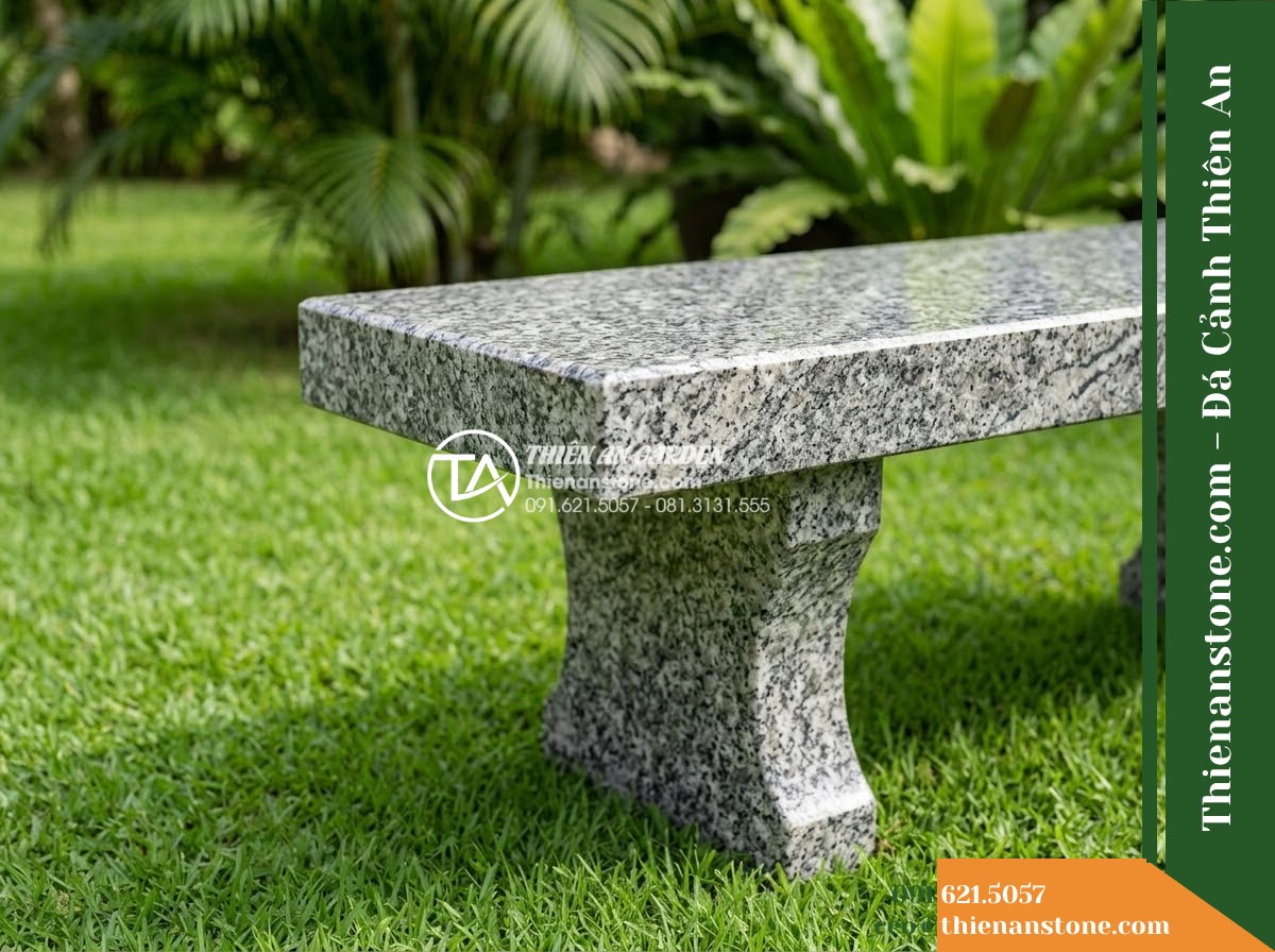 Ghế Đá Granite Nguyên Khối Tường An – Kích thước 160 x 42 x 44 cm – Kiểu dáng thấp gọn, mặt vuông cạnh tinh giản. Chất liệu đá granite - Hình 2 Ghế Đá Granite Nguyên Khối Tường An – Kích thước 160 x 42 x 44 cm – Kiểu dáng thấp gọn, mặt vuông cạnh tinh giản. Chất liệu đá granite - natural granite stone bench with natural veins, sitting on a manicured lawn with