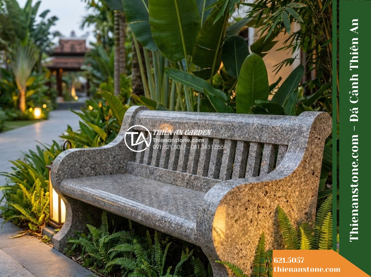 Ghế Đá Granito Phúc Thịnh – Kích thước 170 x 50 x 78 cm – Kiểu dáng tựa nan dọc thưa, hai đầu vuốt cong. Chất liệu đá granito (đá mài) - Hình 4 Ghế Đá Granito Phúc Thịnh – Kích thước 170 x 50 x 78 cm – Kiểu dáng tựa nan dọc thưa, hai đầu vuốt cong. Chất liệu đá granito (đá mài) - A granito polished stone stone bench integrated into a Vietnamese luxury resort
