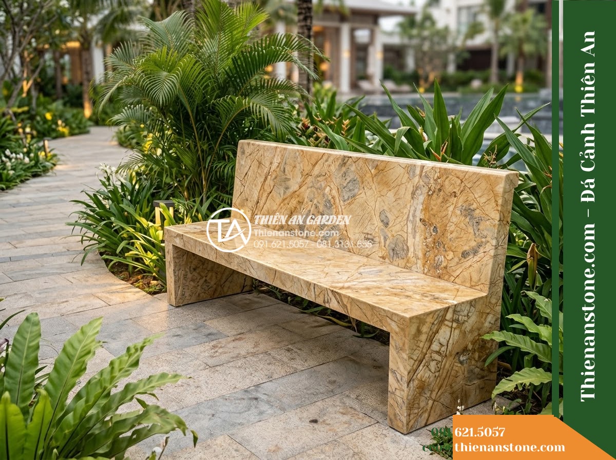 Ghế Đá Sân Trường Thành Tài – Kích thước 180 x 48 x 80 cm – Kiểu dáng tựa liền rộng, mặt ngồi phẳng. Chất liệu đá vàng cẩm thạch - Hình 4 Ghế Đá Sân Trường Thành Tài – Kích thước 180 x 48 x 80 cm – Kiểu dáng tựa liền rộng, mặt ngồi phẳng. Chất liệu đá vàng cẩm thạch - A golden marble stone bench integrated into a Vietnamese luxury resort landscape