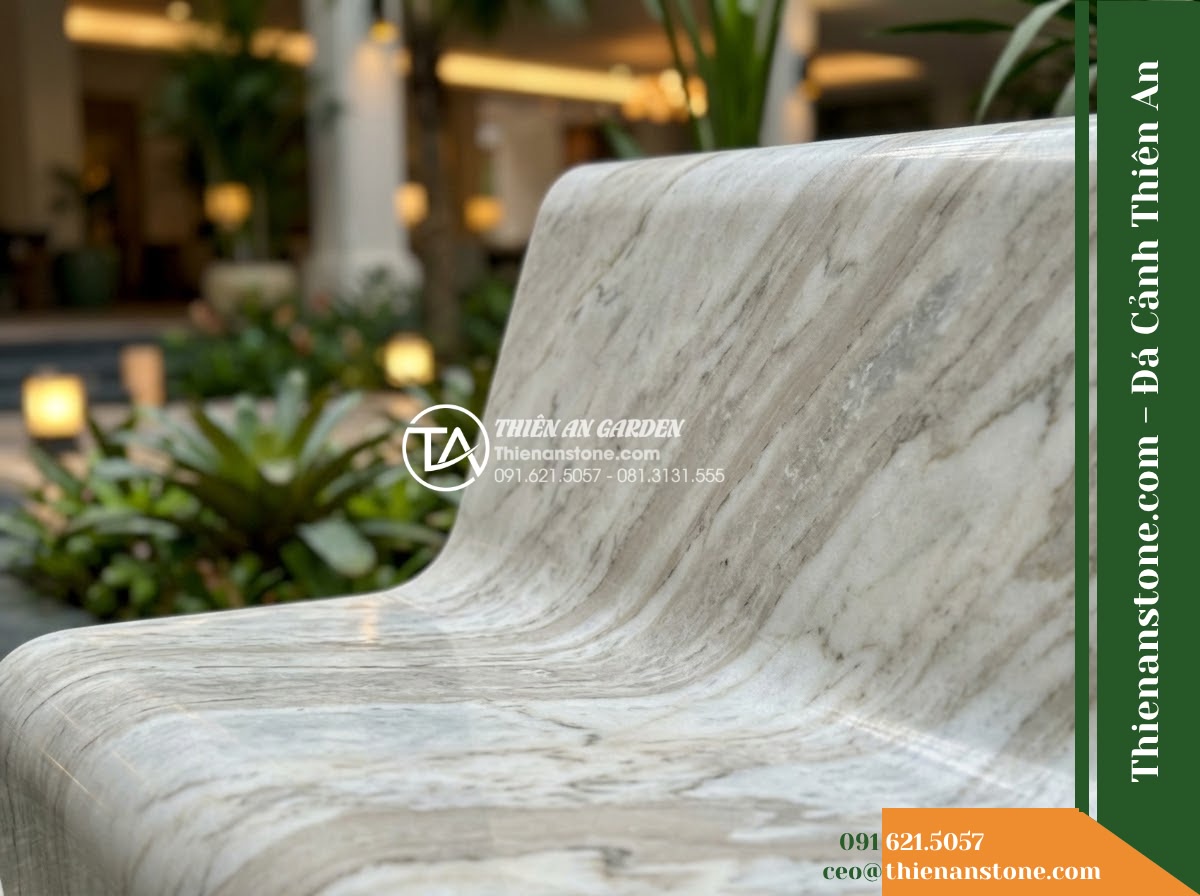Ghế Đá Sân Trường Vươn Cao – Kích thước 155 x 46 x 45 cm – Kiểu dáng băng không tựa, chân chữ T. Chất liệu đá Xanh rêu - Hình 4 Ghế Đá Sân Trường Vươn Cao – Kích thước 155 x 46 x 45 cm – Kiểu dáng băng không tựa, chân chữ T. Chất liệu đá Xanh rêu - A green moss stone stone bench integrated into a Vietnamese luxury resort landsc