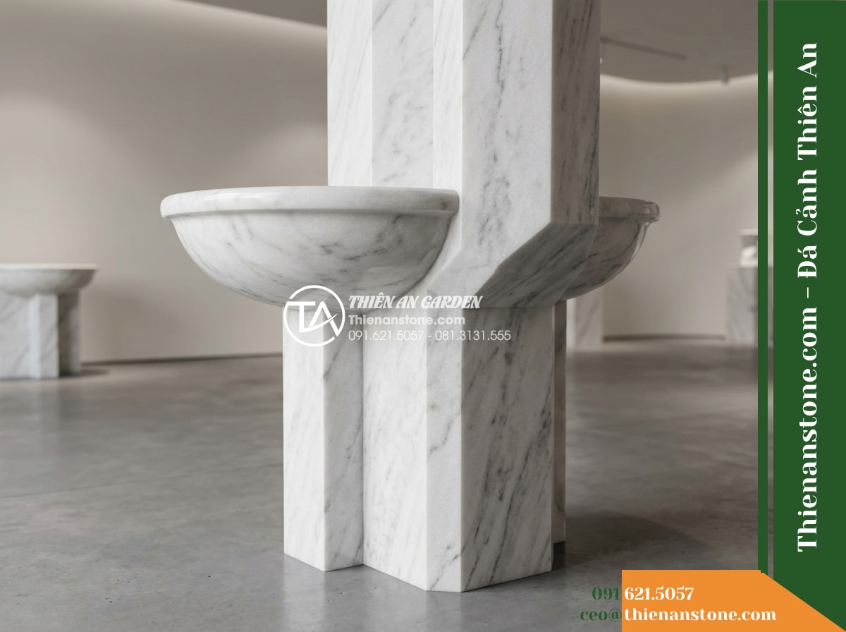 Trụ Phun Lục Giác Đỉnh Bát Phun, D40cm Cao 1m - Hình 4 Trụ Phun Lục Giác Đỉnh Bát Phun, D40cm Cao 1m - Angled close-up view highlighting the tapered junction between the smooth carved