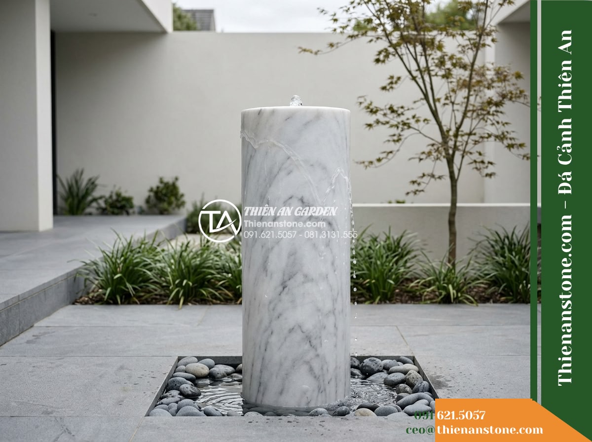 Trụ Phun Tròn Lỗ Xuyên Tâm, Mài Nhẵn D30cm Cao 80cm - Hình 19 Trụ Phun Tròn Lỗ Xuyên Tâm, Mài Nhẵn D30cm Cao 80cm - Pristine architectural photograph of the completed honed stone fountain column f