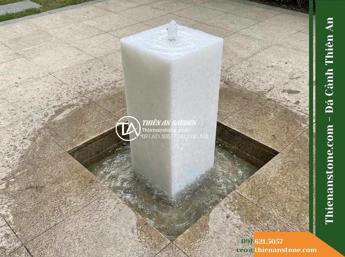 Trụ Phun Vuông Phun Trào Đỉnh, 40x40cm Cao 1.5m - Hình 6 Trụ Phun Vuông Phun Trào Đỉnh, 40x40cm Cao 1.5m - Elevated semi-high angle showing the footprint of the square stone column, the c
